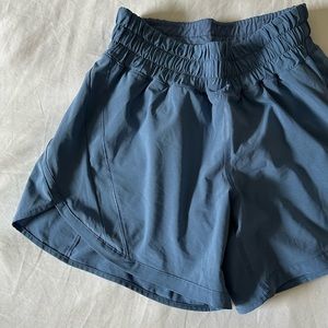 Lululemon blue sport shorts. Cinched waist. Size 4.